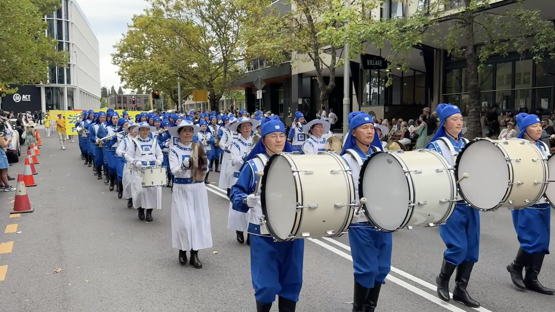 Tian Guo Marching Band drumline marching through the Canberra Multicultural Festival